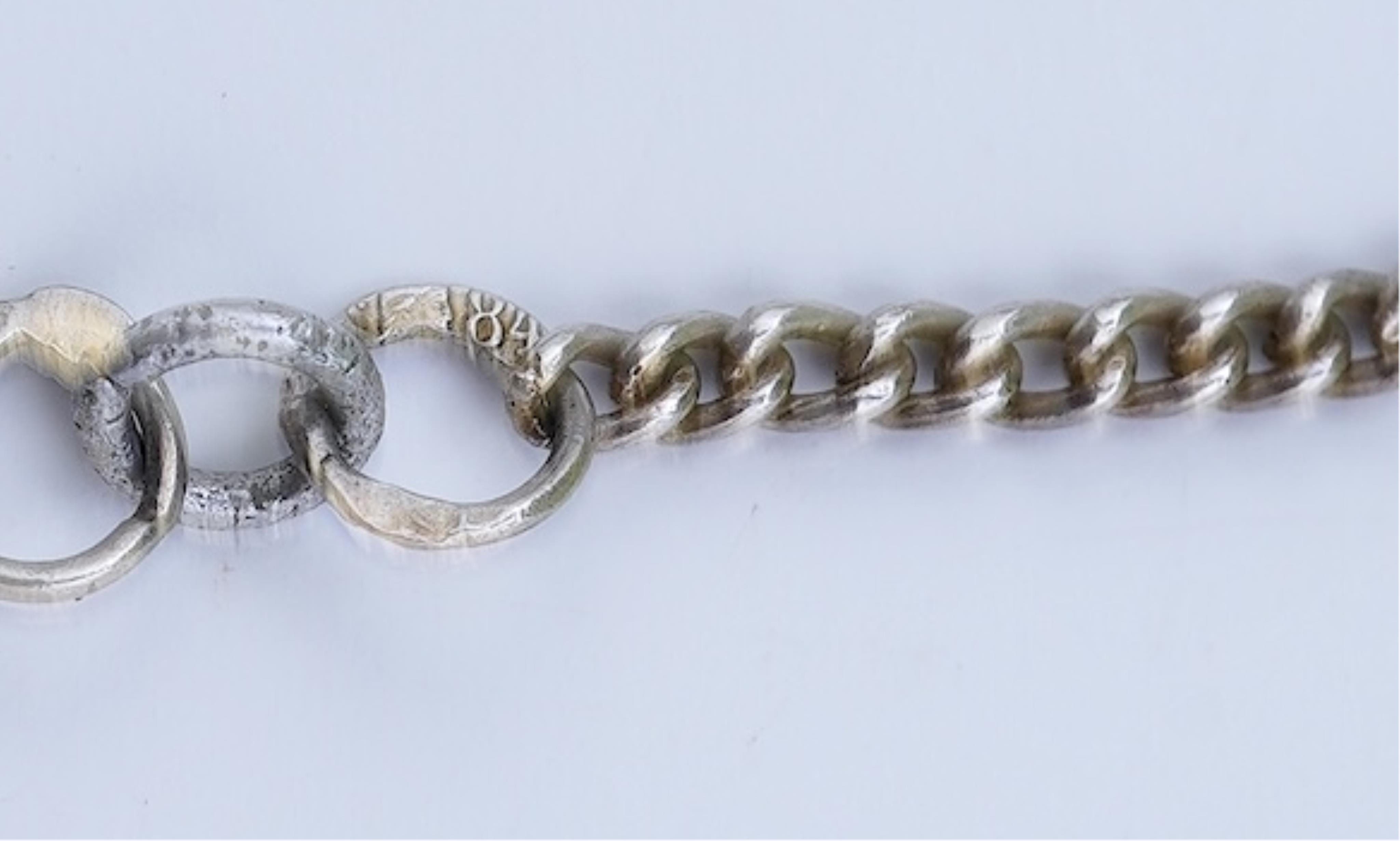 A silver and enamel long chain necklace, Russia, early 20th century